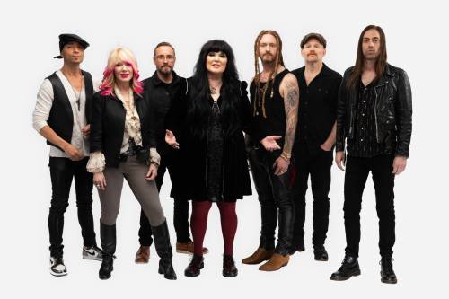 Criss Cain photo
                                Heart frontwomen Nancy (second from left) and Ann Wilson (centre) are back on the road following a health scare.