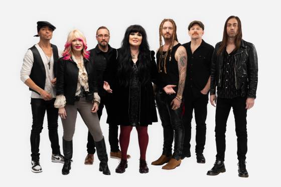 Heart frontwomen Nancy (second from left) and Ann Wilson (centre) are back on the road following a health scare. (Criss Cain photo)