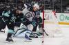 LINDSEY WASSON / THE ASSOCIATED PRESS
                                Winnipeg Jets’ Nino Niederreiter (centre) battles for the puck against the Seattle Kraken. The winger admits his offensive drought is starting to wear on him.