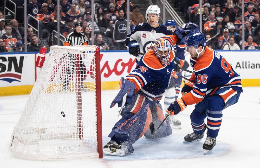 Jason Franson / THE CANADIAN PRESS
Vladislav Namestnikov watches Cole Perfetti’s first-period goal beat Oliers’ goalie Stuart Skinner.