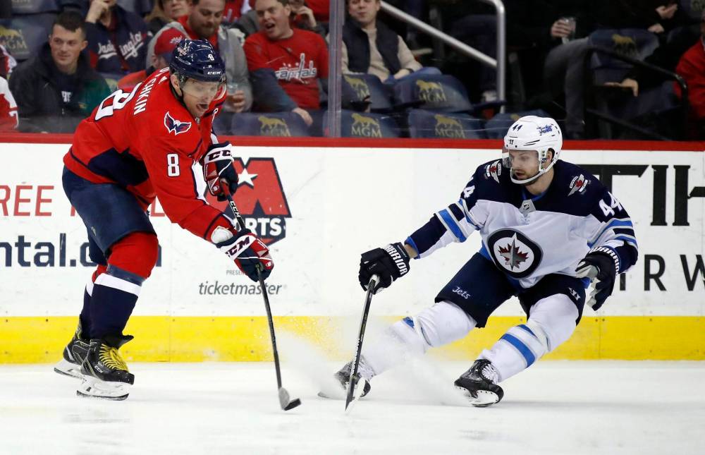 ALEX BRANDON / THE ASSOCIATED PRESS FILES
Winnipeg Jets defenceman Josh Morrissey (right) tries to block Washington Capitals’ Alex Ovechkin. The Jets enter Tuesday’s contest two points behind the Capitals in the chase for the Presidents’ Trophy.