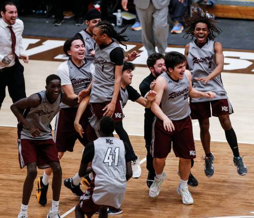 JOHN WOODS / FREE PRESS
                                The Kildonan-East Reivers celebrate capturing the men’s provincial high school title.