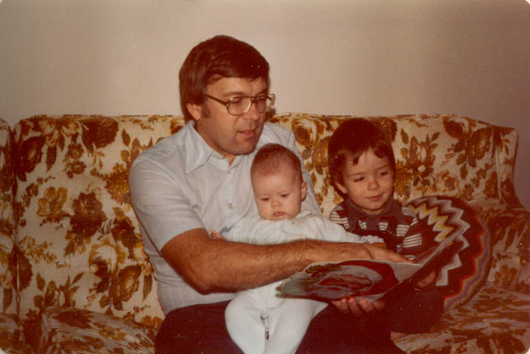 Supplied
Schellenberg reading to his two children, Angela (left) and Harold in 1980. He was a strong advocate for early childhood education.