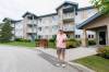 MIKE DEAL / FREE PRESS FILES
                                Michael Bruneau, president and CEO of Aurora Recovery Centre, in front of the condominium development at 873 Waverley Street in 2024.