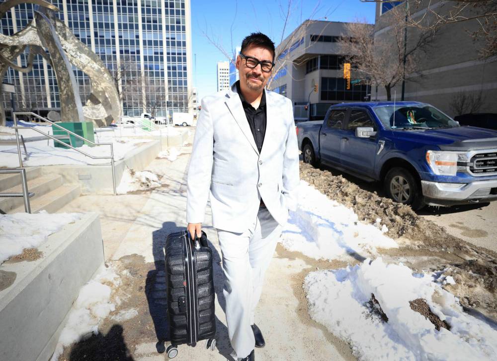 RUTH BONNEVILLE / FREE PRESS
Christopher Traverse, chief of Lake St. Martin First Nation, leaves court Monday, the first day of his trial on charges of sexual assault, possessing and creating child pornography and sexual interference.