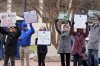 FILE - Demonstrators gather outside of the Edward A. Garmatz United States District Courthouse in Baltimore, on Friday, March 14, 2025, before a hearing regarding the Department of Government Efficiency's access to Social Security data. (AP Photo/Stephanie Scarbrough, File)