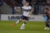 Vancouver Whitecaps defender Ranko Veselinović (4) moves the ball during first-half MLS soccer match action against FC Dallas in Frisco, Texas, Saturday, March 15, 2025. (AP Photo/LM Otero)