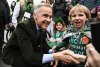 Prime Minister Mark Carney meets young members of the crowd during the annual St. Patrick's Day Parade in Montreal, Saturday, March 16, 2025. THE CANADIAN PRESS/Graham Hughes