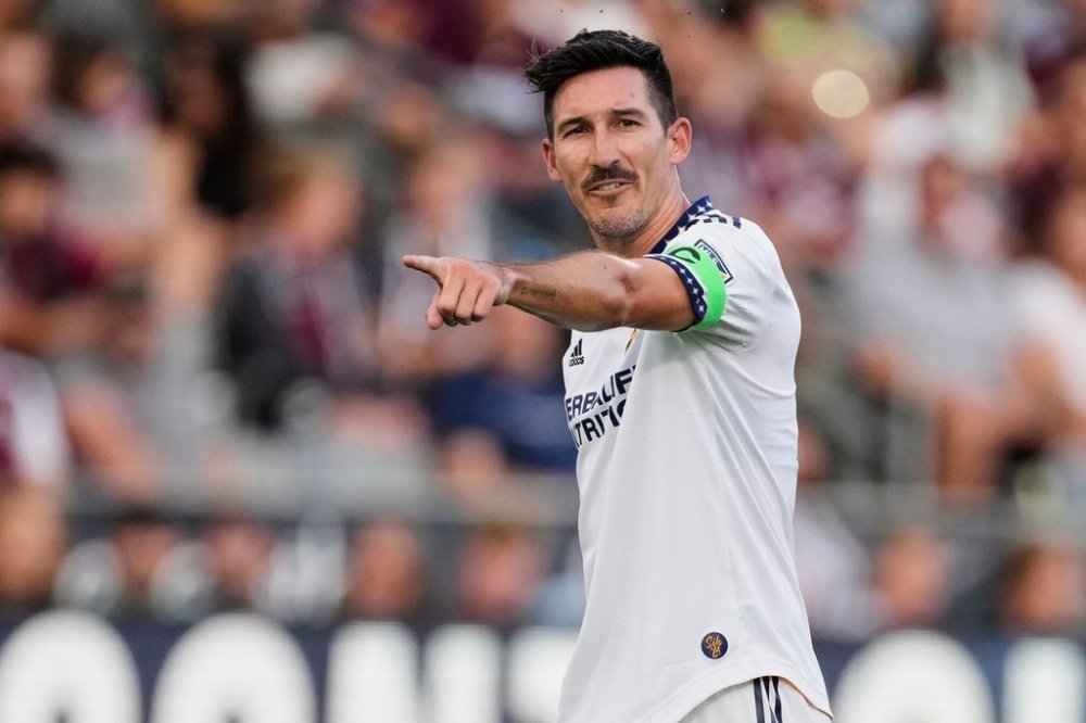 FILE - Los Angeles Galaxy midfielder Sacha Kljestan (16) directs teammates during the first half of an MLS soccer match Saturday, July 16, 2022, in Commerce City, Colo. (AP Photo/David Zalubowski, File)