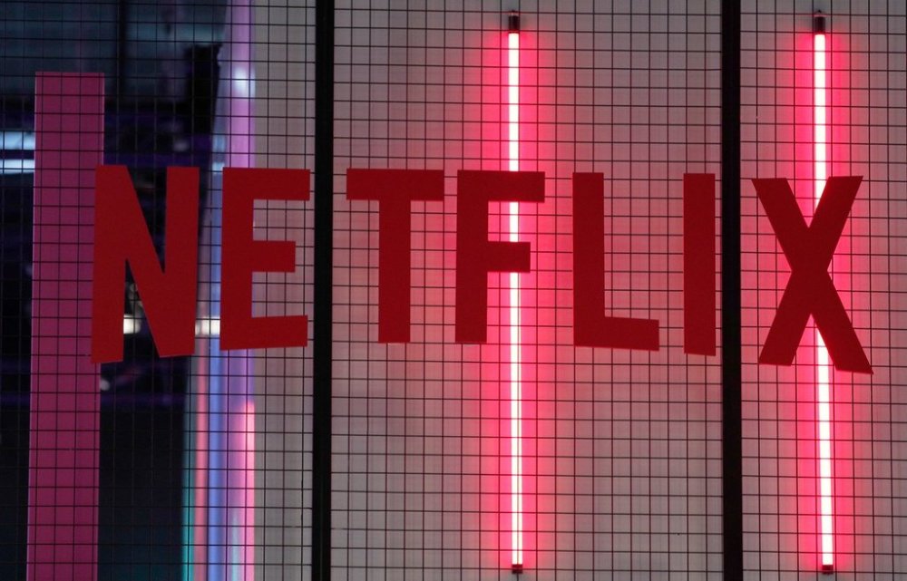 FILE- In this Nov. 4, 2017, file photo, the logo of entertainment company Netflix is pictured in Paris. (AP Photo/Christophe Ena, File)