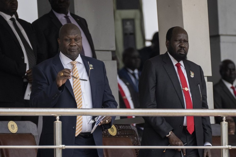 FILE - South Sudan's President Salva Kiir, right, and Vice President Riek Machar, left, attend a Holy Mass led by Pope Francis at the John Garang Mausoleum in Juba, South Sudan Sunday, Feb. 5, 2023. (AP Photo/Ben Curtis, File)