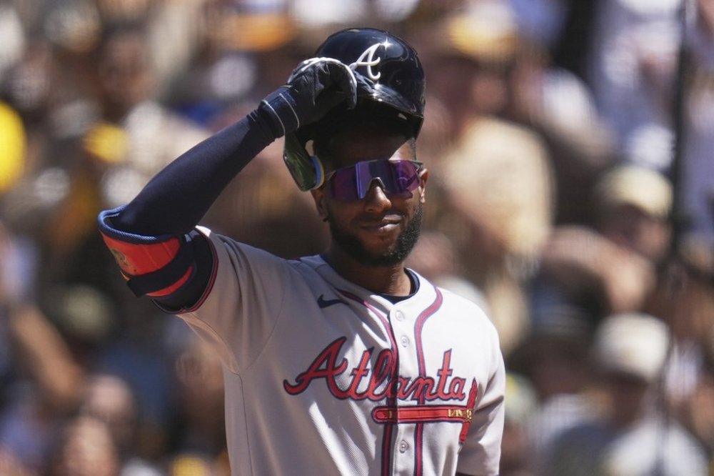 FILE - Atlanta Braves' Jurickson Profar acknowledges the crowd as he walks up to bat during the first inning of an opening-day baseball game against his former team, the San Diego Padres, March 27, 2025, in San Diego. (AP Photo/Gregory Bull, File)