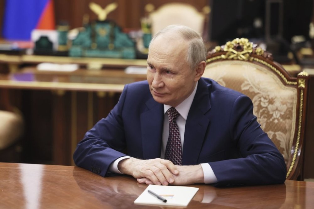 Russian President Vladimir Putin speaks with Irina Gekht, the newly appointed governor of Nenets Autonomous District, during their meeting at the Kremlin in Moscow, Russia, Tuesday, March 18, 2025. (Mikhail Metzel, Sputnik, Kremlin Pool Photo via AP)
