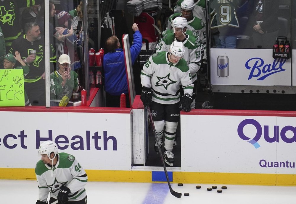 Dallas Stars right wing Mikko Rantanen steps on the ice to warm up before an NHL hockey game against his former team, the Colorado Avalanche, Sunday, March 16, 2025, in Denver. (AP Photo/David Zalubowski)