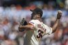 San Francisco Giants pitcher Justin Verlander throws during the first inning of a baseball game against the Seattle Mariners in San Francisco, Friday, April 4, 2025. (AP Photo/Nic Coury)