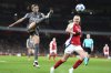Real Madrid's Sheila Garcia, left, and Arsenal's Frida Maanum battle for the ball during the Women's Champions League, quarter-final, second leg soccer match between Arsenal and Real Madrid in London, Wednesday March 26, 2025. (Adam Davy/PA via AP)