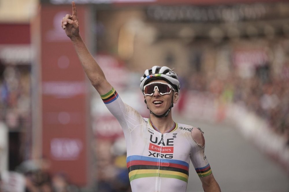 Tadej Pogačar riding for the UAE Team Emirates celebrates winning 19th edition of the Strade Bianche (White Roads) a 213 km one day race from Siena, Italy, Saturday March 8, 2025. (Marco AlpozziLaPresse via AP)