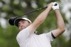 Scottie Scheffler tees off on the 18th hole during the first round of the Houston Open golf tournament, Thursday, March 27, 2025, in Houston. (AP Photo/Michael Wyke)
