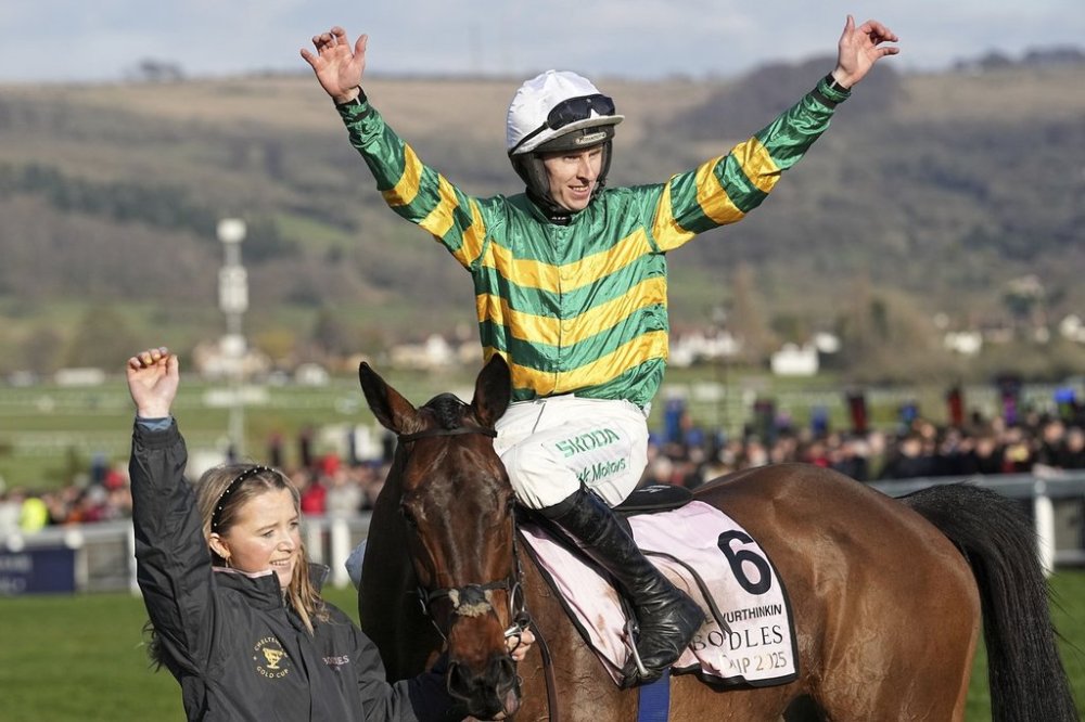 Mark Walsh on Inothewayurthinkin celebrates winning the Cheltenham Gold Cup during the final day of the British Horse Racing Cheltenham Festival at Cheltenham Racecourse, England, Friday, March 14, 2025. (AP Photo/Dave Shopland)