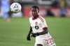 Toronto FC midfielder Richie Laryea (22) in action during the first half of an MLS soccer match against D.C. United, Saturday, Feb. 22, 2025, in Washington. (AP Photo/Nick Wass)