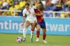 Canada's Nyah Rose, left, and Spain's Sandra Villafane fight for the ball during a U-20 Women's World Cup round of sixteen soccer match in Cali, Colombia, Wednesday, Sept. 11, 2024. (AP Photo/Dolores Ochoa)