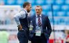 FILE - England head coach Gareth Southgate, left, talks with Under 21 manager and delegation member Adrian Boothroyd on the pitch before the quarterfinal match between Sweden and England at the 2018 soccer World Cup in the Samara Arena, in Samara, Russia, Saturday, July 7, 2018. (AP Photo/Alastair Grant, File)