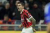 AC Milan's Christian Pulisic celebrates after scoring during the Italian Serie A soccer match between AC Milan and Como at the San Siro Stadium in Milan, Italy, Saturday, March 15, 2025. (Spada/LaPresse via AP)