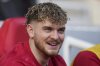 Liverpool's Harvey Elliott smiles ahead of the English Premier League soccer match between Liverpool and Southampton at Anfield in Liverpool, Saturday, March 8, 2025. (AP Photo/Jon Super)