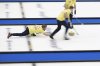 Sweden skip Niklas Edin throws a stone in the gold-medal game against Canada at the world men's curling championship at the IWC Arena in Schaffhausen, Switzerland, on Sunday, April 7, 2024. (Christian Beutler/Keystone via AP)