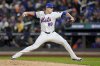 FILE - New York Mets pitcher Phil Maton throws against the Los Angeles Dodgers during the seventh inning in Game 4 of a baseball NL Championship Series, Thursday, Oct. 17, 2024, in New York. (AP Photo/Frank Franklin II, File)