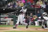 Minnesota Twins' Trevor Larnach hits a single during the first inning of a baseball game against the Chicago White Sox in Chicago, Tuesday, April 1, 2025. (AP Photo/Nam Y. Huh)