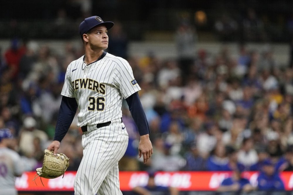FILE - Milwaukee Brewers' Tobias Myers looks away as he walks to the dugout during the fourth inning of a baseball game against the New York Mets, Sept. 28, 2024, in Milwaukee. (AP Photo/Aaron Gash, File)