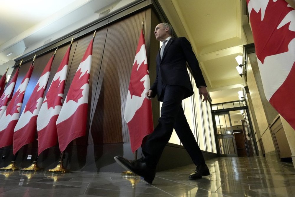Prime Minister Mark Carney arrives to a press conference, in Ottawa, Thursday, March 27, 2025. THE CANADIAN PRESS/Frank Gunn