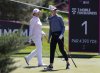 Nelly Korda, right, watches her tee shot as Ariya Jutanugarn of Thailand takes her turn during the third round of the LPGA T-Mobile Match Play golf tournament at Shadow Creek Golf Course, Friday, April 4, 2025, in North Las Vegas. (Bizuayehu Tesfaye/Las Vegas Review-Journal via AP)