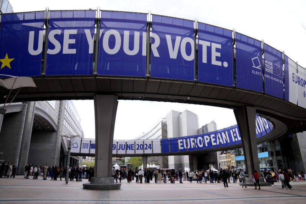 FILE - People wait in line to visit the European Parliament during Europe Day celebrations in Brussels on May 4, 2024. (AP Photo/Virginia Mayo, File)