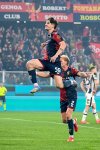 Genoa's Alessandro Zanoli celebrates scoring during the Serie A soccer match between Genoa and Udinese at the Luigi Ferraris Stadium in Genoa, Italy, Friday, April 4, 2025. (Tano Pecoraro/LaPresse via AP)