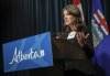 Alberta Premier Danielle Smith provides an update in Calgary on Wednesday, Feb. 19, 2025. Smith says U.S. President Donald Trump's latest tariff announcement might push a trade agreement renegotiation until after Canada's federal election. THE CANADIAN PRESS/Jeff McIntosh