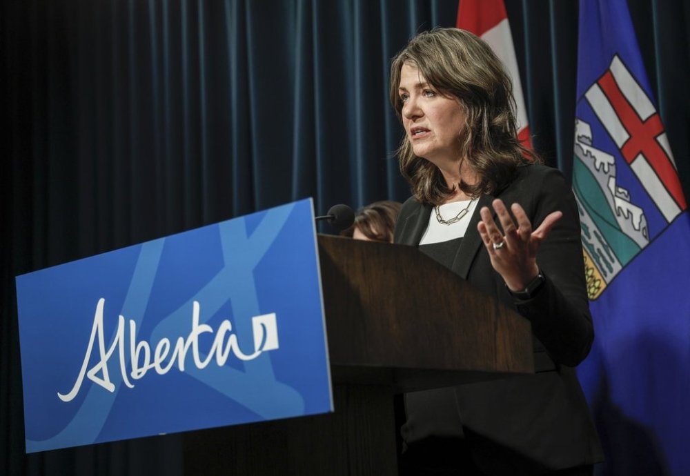 Alberta Premier Danielle Smith speaks at a press conference in Calgary, Alta., Wednesday, Feb. 19, 2025. THE CANADIAN PRESS/Jeff McIntosh