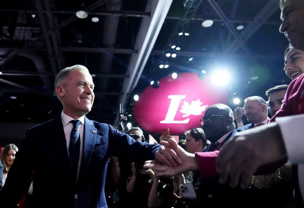 Liberal Party of Canada leadership candidate Mark Carney is introduced during the Liberal leadership announcement in Ottawa on Sunday, March 9, 2025. THE CANADIAN PRESS/Justin Tang