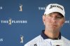 Lucas Glover listens to a question after completing the first round of The Players Championship golf tournament Thursday, March 13, 2025, in Ponte Vedra Beach, Fla. (AP Photo/Chris O'Meara)