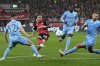 Leverkusen's Aleix Garcia scores during the German Bundesliga soccer match between Bayer Leverkusen and VfL Bochum at the BayArena in Leverkusen, Germany, Friday, March 28, 2025. (AP Photo/Martin Meissner)