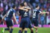Bochum's Cristian Gamboa, center left, and Tom Krauss celebrate after the German Bundesliga soccer match between Bayern Munich and VfL Bochum at the Allianz Arena in Munich, Germany, Saturday, March 8, 2025. (Sven Hoppe/dpa via AP)