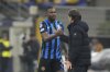 Inter Milan's Marcus Thuram, left, and Inter Milan's head coach Simone Inzaghi during a Champions League round of 16 second leg soccer match between Inter Milan and Feyenoord, at the San Siro stadium in Milan, Italy, Tuesday, March 11, 2025. (AP Photo/Luca Bruno)