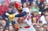 St. Louis Cardinals' Iván Herrera watches the ball during the ninth inning of a baseball game against the Boston Red Sox, Friday, April 4, 2025, in Boston. (AP Photo/Mark Stockwell)