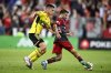 Toronto FC forward Lorenzo Insigne (24) is defended by Columbus Crew defender Andres Herrera, during first half MLS soccer action, in Toronto on Wednesday, September 18, 2024. THE CANADIAN PRESS/Chris Katsarov