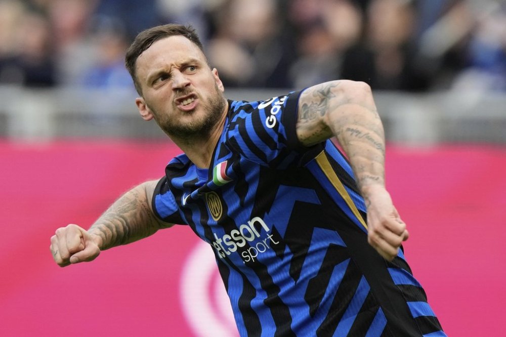 Inter Milan's Marko Arnautovic reacts after he scored during a Serie A soccer match between Inter Milan and Udinese at the San Siro stadium in Milan, Italy, Sunday, March 30, 2025. (AP Photo/Luca Bruno)