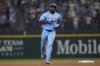 Texas Rangers' Adolis García runs the bases after hitting a home run during the sixth inning of a baseball game against the Boston Red Sox, Sunday, March 30, 2025, in Arlington, Texas. (AP Photo/LM Otero)