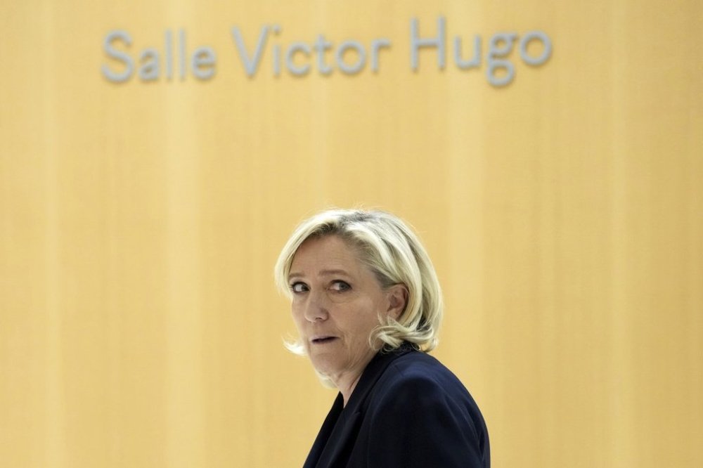 FILE - French far-right leader Marine Le Pen arrives at the courtroom for the trial over the suspected embezzlement of European Parliament funds, Wednesday, Nov. 6, 2024 in Paris. (AP Photo/Aurelien Morissard, File)