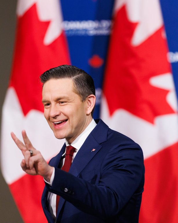 Conservative Party Leader Pierre Poilievre gestures as he arrives to a campaign event in Toronto, Wednesday, April 2, 2025. THE CANADIAN PRESS/Cole Burston