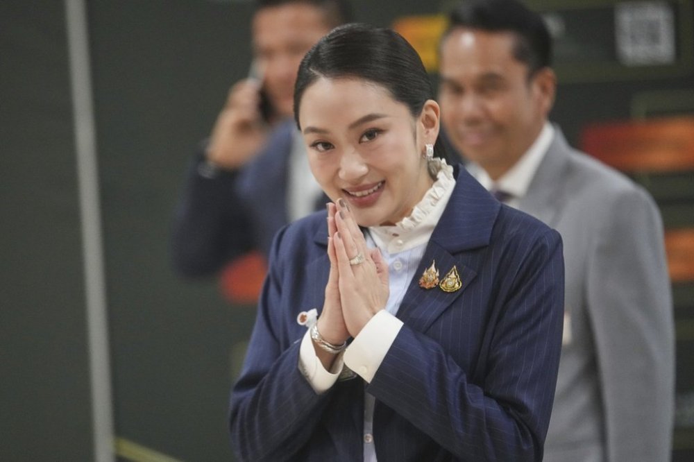 Thailand's Prime Minister Paetongtarn Shinawatra arrives at parliament before no-confidence vote against her in Bangkok, Thailand, Wednesday, March 26, 2025. (AP Photo/Sakchai Lalit)